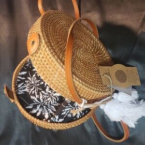 Handcrafted in Vietnam woven round purse with leather strap
